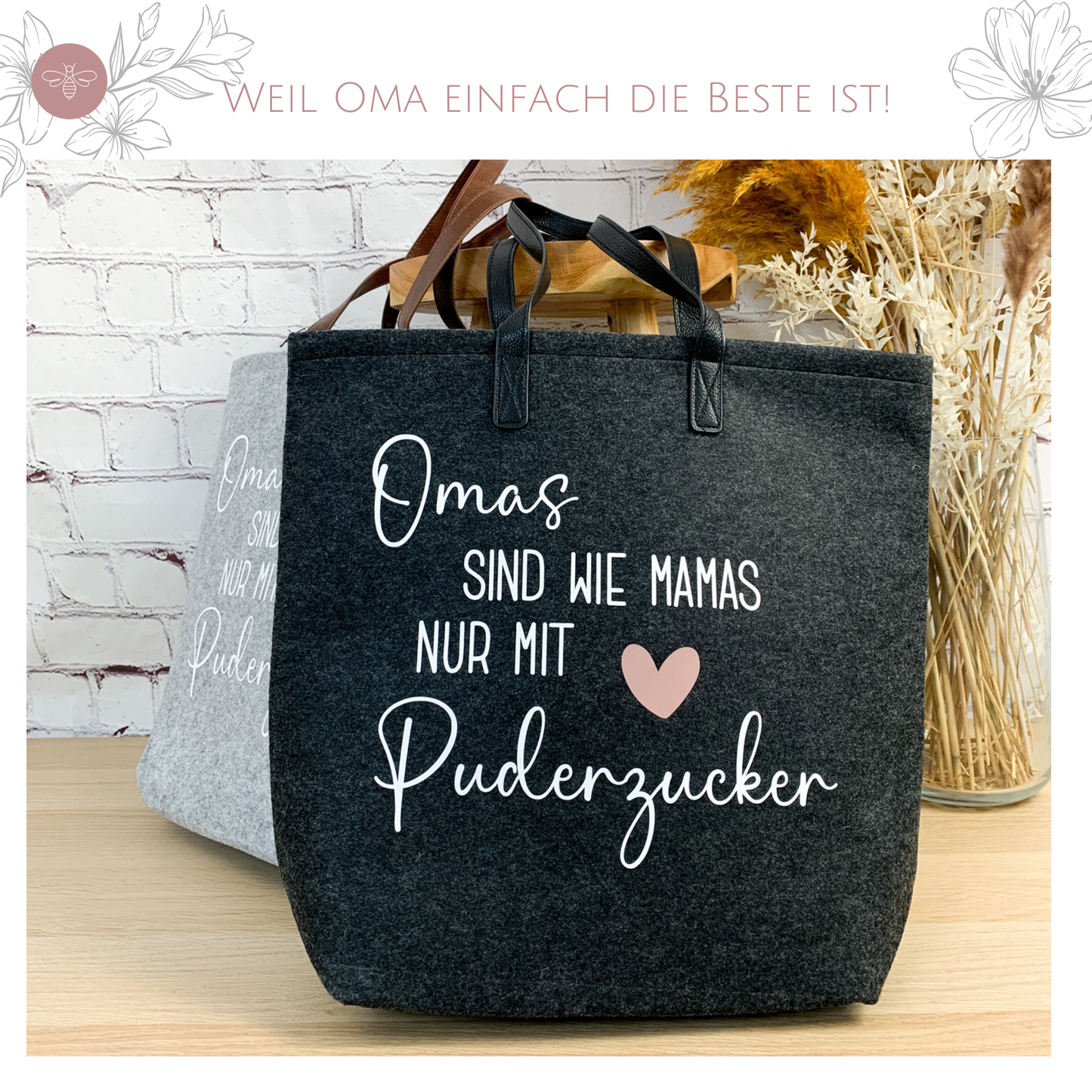 Filztasche in Anthrazit mit weißen Schriftzug "Omas sind wie Mamas nur mit Puderzucker" – geräumig und nachhaltig.