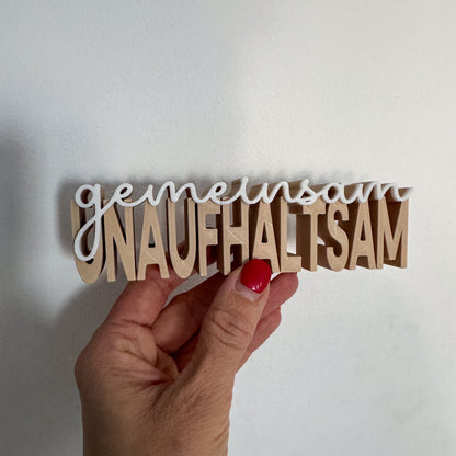 3D Schriftzug gemeinsam unaufhaltsam