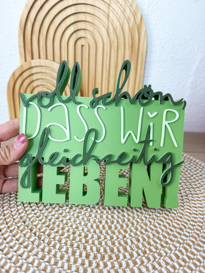 3D Schriftzug Gleichzeitig Leben Grün – B-Ware