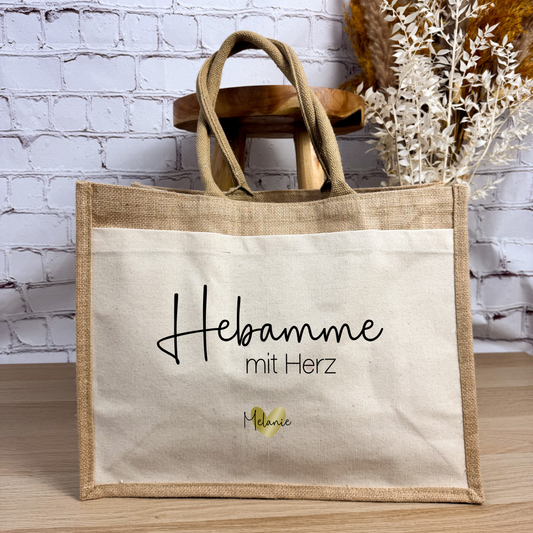 Jutetasche mit Aufdruck „Hebamme mit Herz“ als liebevolles Dankeschön für Hebammen.