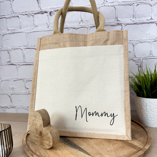 Jutetasche Mommy aus Jute mit Frontfach und Mommy-Schriftzug in Schwarz