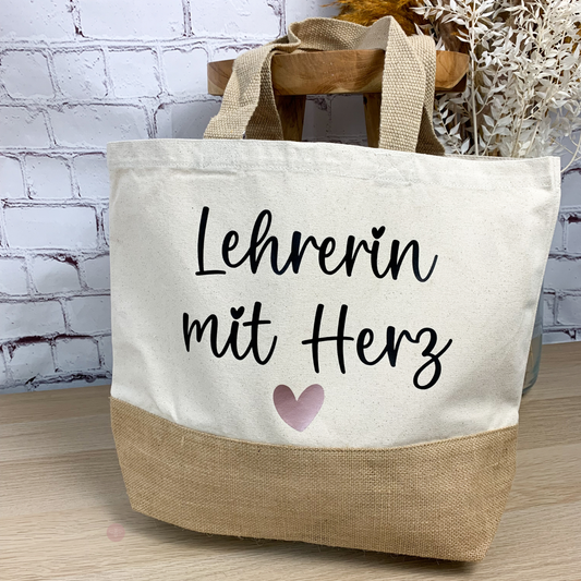 Baumwolljuteshopper mit der Aufschrift "Lehrerin mit Herz" – das perfekte Geschenk für engagierte Lehrerinnen